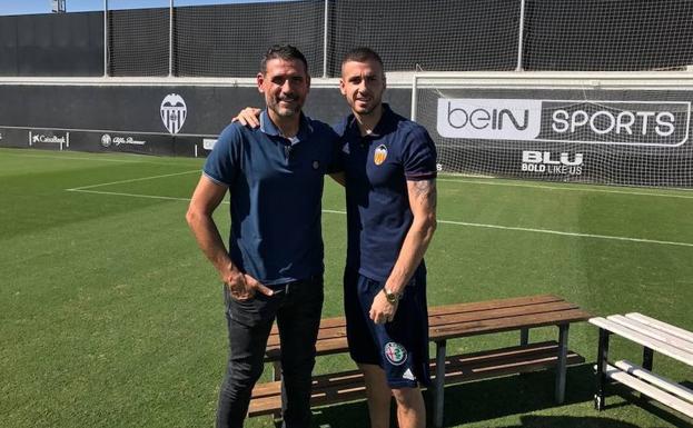 Jaume Doménech y Andrés Palop en el encuentro de hoy./VALENCIA CF