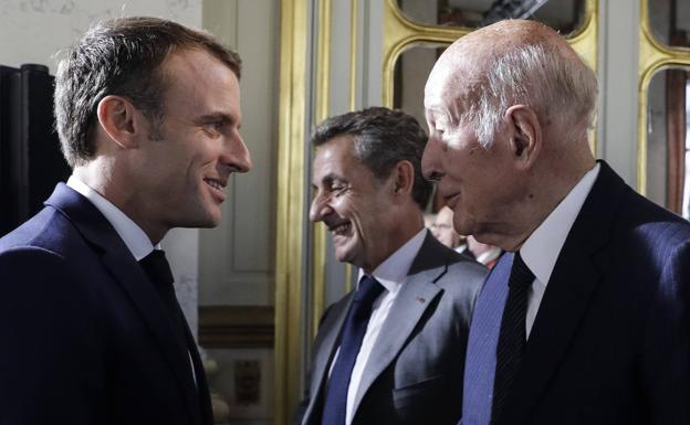 Emmanuel Macron, Nicolas Sarkozy y Valery Giscard d'Estaing./AFP